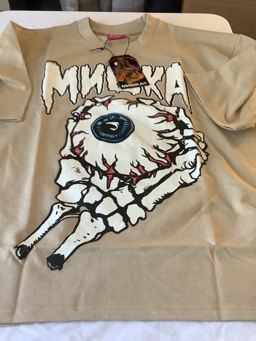Mishka NYC shirts. New with Tags and in bags Bundle. Beige with Graphic Design.